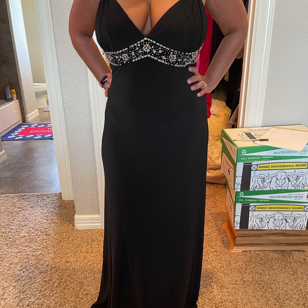 Stunning black beaded XScape formal gown